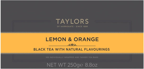 A large grey cardboard box with 100 individually wrapped and tagged Taylors of Harrogate English Breakfast tea bags. Orange label – Black tea with natural flavourings