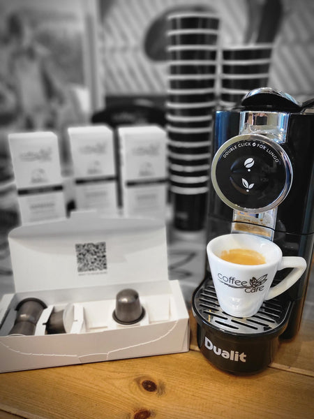 a brewed coffee capsule in Coffee Care espresso cup using a dualit capsule machine