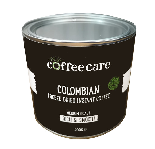 Higher view showing the lid to a metal tin of Coffee Care's Colombian Freeze Dried Instant Coffee. 500g of arabica coffee. Medium roast, rich and smooth