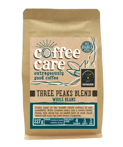 A 227g kraft packet of Coffee Care’s Three Peaks Coffee Beans. Blue label for whole beans. Freshly roasted Kenya, Central & South America Coffee. 100% Arabica. Delicuouslyorkshire Winner 2017