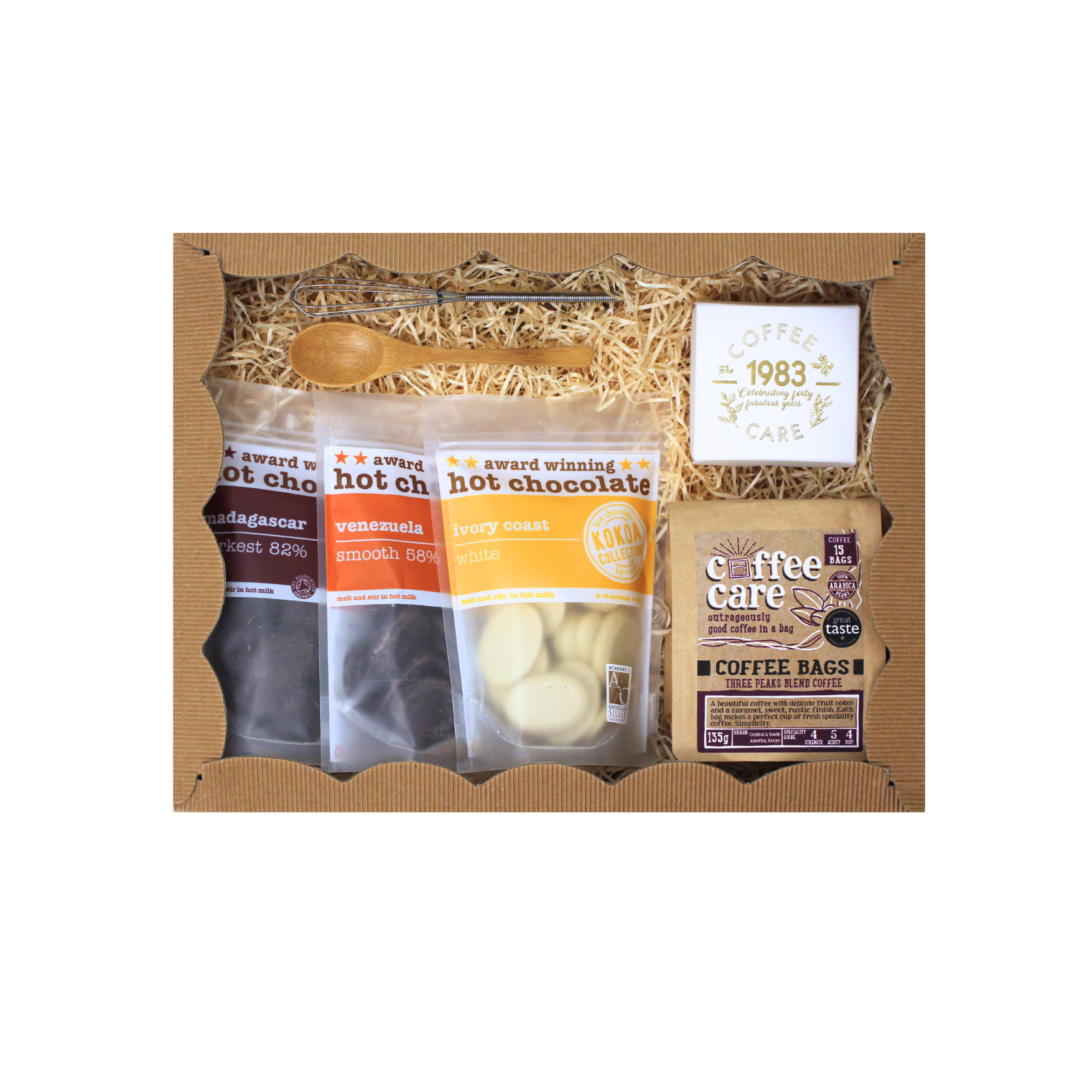 A hamper for the chocoholic and coffee lover. Coffee Bags, Kokoa Collection white, Venezuela, Madagascar, whitakers chocolate truffles, bamboo spoon and whisk