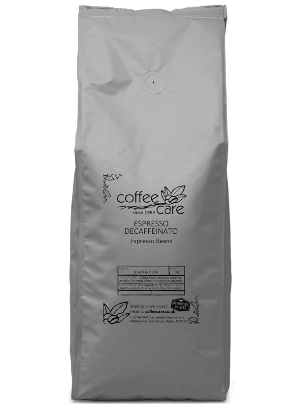 1 kilo grey recyclable bag of Coffee Care’s Espresso Decaffeinato Espresso Beans. Freshly roasted Brazil and India coffee