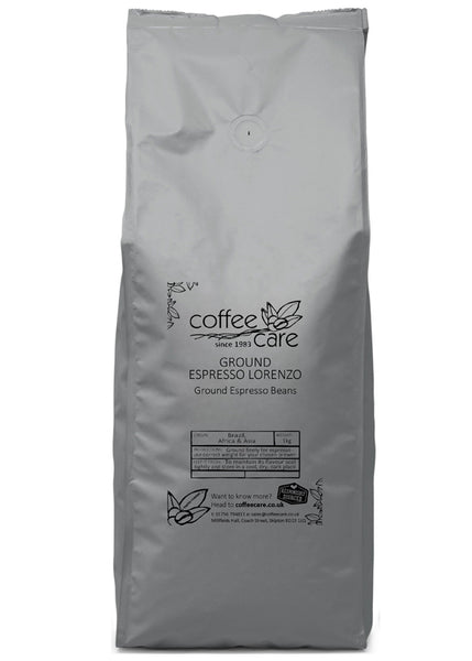  A 1 kilo grey recyclable packet of Coffee Care’s Espresso Lorenzo Ground Espresso Beans. Freshly roasted & ground Brazil, Africa & Asia Coffee.