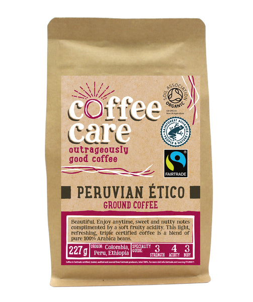 A 227g kraft packet of Coffee Care’s Peruvian Etico ground coffee. Pink label ground for filter & cafetiere. Freshly roasted & ground Peru, Colombia & Ethiopia Coffee. Organic, Rainforest and Fairtrade Certified