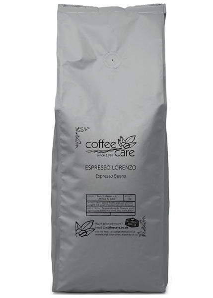 A 1 kilo grey recyclable packet of Coffee Care’s Espresso Lorenzo Espresso Beans. Freshly roasted Brazil, Africa & Asia Coffee