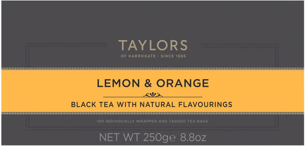 A large grey cardboard box with 100 individually wrapped and tagged Taylors of Harrogate English Breakfast tea bags. Orange label – Black tea with natural flavourings