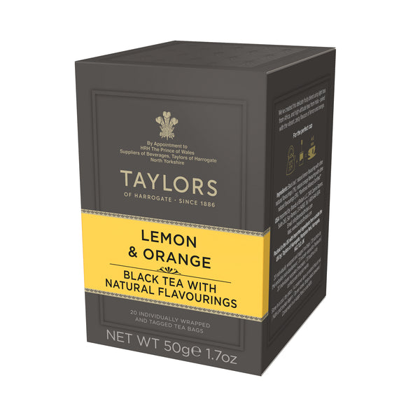 Side view of small grey cardboard box with 20 individually wrapped and tagged Taylors of Harrogate Lemon & Orange. Orange label – Zesty & vibrant black tea