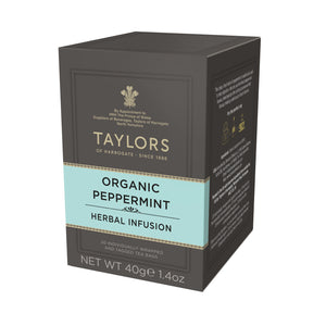 Side view of small grey cardboard box with 20 individually wrapped and tagged Taylors of Harrogate Organic Peppermint. Light blue label – Fresh & vibrant caffeine free infusion