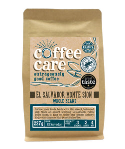 A 227g kraft packet of Coffee Care’s El Salvador Monte Sion Estate Coffee Beans. Blue label for whole beans. Freshly roasted El Salvador Coffee. 100% Arabica beans, Rainforest Certified. Great Taste Award winner 2014 and 2022