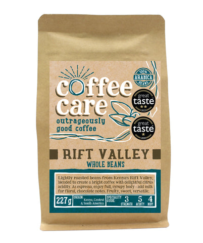 A 227g kraft packet of Coffee Care’s Rift Valley Coffee Beans. Blue label for whole beans. Freshly roasted Kenya, Central & South America Coffee. 100% Arabica. Great Taste Award Winner 2017, 2022 and 2024.