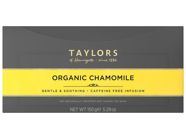 A large grey cardboard box with 100 individually wrapped and tagged Taylors of Harrogate Organic Chamomile. Yellow label – Gentle a& soothing caffeine free infusion