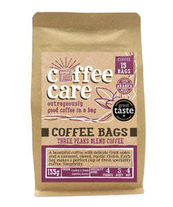 A kraft packet of Coffee Care’s Three Peaks Blend Coffee Bags. 15 coffee bags of speciality freshly roasted & ground , Central & South America Coffee. 100% Arabica. Deliciouslyorkshire Winner 2017 and Great Taste Award Winner 2021!