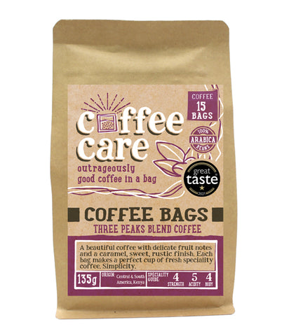 A kraft packet of Coffee Care’s Three Peaks Blend Coffee Bags. 15 coffee bags of speciality freshly roasted & ground , Central & South America Coffee. 100% Arabica. Deliciouslyorkshire Winner 2017 and Great Taste Award Winner 2021!