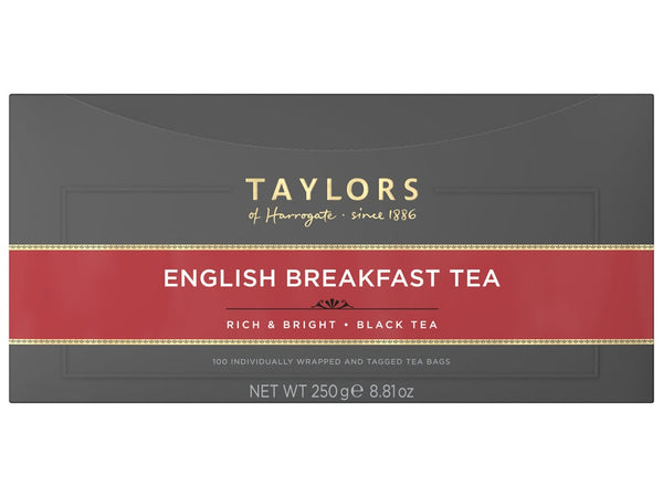 A large grey cardboard box with 100 individually wrapped and tagged Taylors of Harrogate English Breakfast tea bags. Red label – Rich & bright black tea