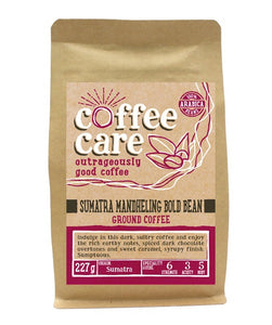 A 227g kraft packet of Coffee Care’s Sumatra Mandheling Bold Bean ground coffee. Pink label ground for filter & cafetiere. Freshly roasted & ground Sumatran Coffee. 100% Arabica Beans