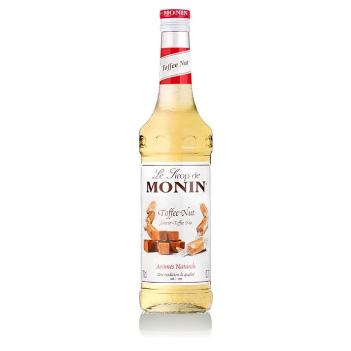 A 70cl glass bottle of MONIN Toffee Nut  Syrup.