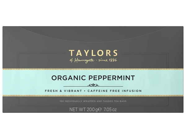 A large grey cardboard box with 100 individually wrapped and tagged Taylors of Harrogate Organic Peppermint. Light blue label – Fresh & vibrant caffeine free infusion