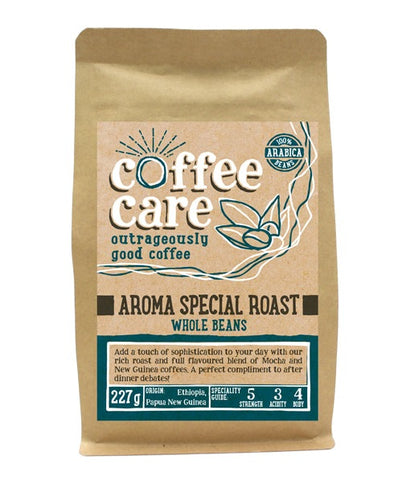 A 227g kraft packet of Coffee Care’s Aroma Special Roast Coffee. Blue label for whole beans. Papua New Guinea & Ethiopia coffee. 100% Arabica whole beans