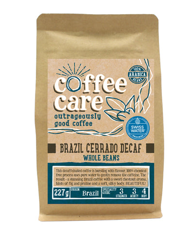 A 227g kraft packet of Coffee Care’s Brazil Cerrado Swiss Water Process Decaffeinated Coffee. Blue label for whole beans. 100% Arabica wholebeans