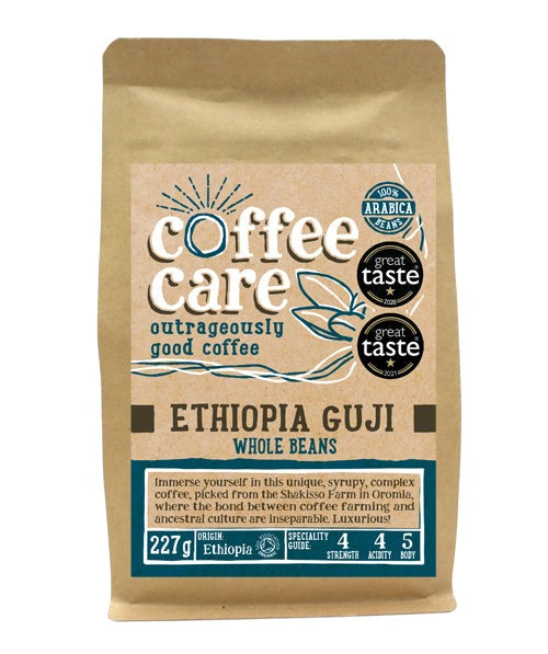 A 227g kraft packet of Coffee Care’s Ethiopia Guji Coffee. Blue label for whole beans. From the Shakkiso Farm, Oromia Region, Ethiopia coffee. 100% Arabica whole beans