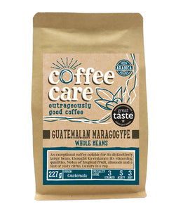 A 227g kraft packet of Coffee Care’s Guatemalan Maragogype Coffee Beans. Blue label for whole beans. Freshly roasted Guatemalan Coffee. 100% Arabica. Great Taste Award Winner 2017