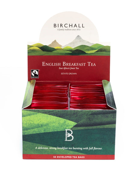 Hill graphics on an open cardboard box of 50 Birchall English Breakfast enveloped tea bags. Fairtrade certified, a delicious strong breakfast tea bursting with full flavour.