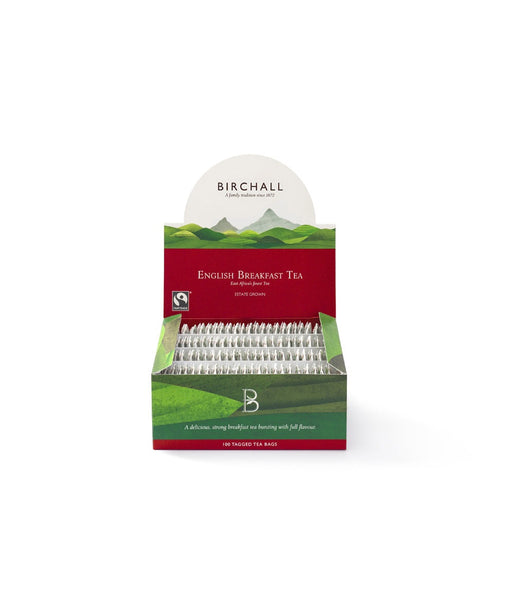 Hill graphics on an open cardboard box of 100 Birchall English Breakfast tagged tea bags. Fairtrade certified, a delicious strong breakfast tea bursting with full flavour.