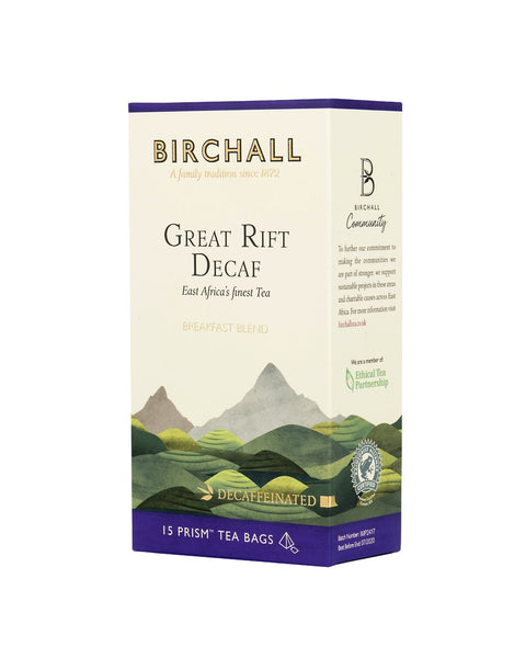 Right side view of cardboard box of 15 Birchall Great Rift Decaf prism tea bags. Green hill graphics with purple band, East Africa’s finest tea, breakfast blend. Decaffeinated.