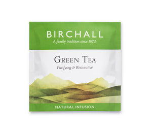 A single green enveloped tea bag of Birchall Green Tea. Purifying & restorative. Natural Infusion