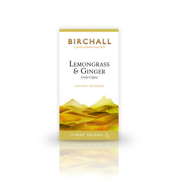 Front view of cardboard box of 15 Birchall Lemongrass & Ginger prism tea bags. Yellow hill graphics with yellow band, lively & spicy, natural infusion. Caffeine free.
